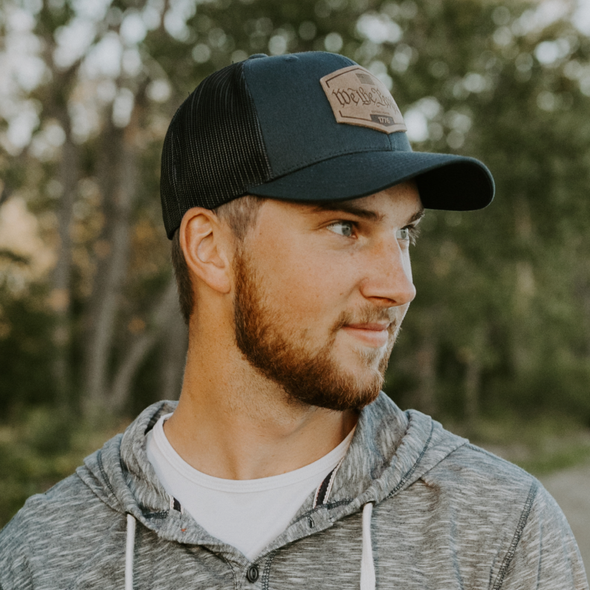 We The People Hat | Leather Patch Trucker Hat