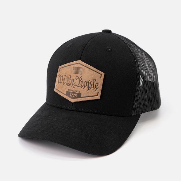 We The People Hat | Leather Patch Trucker Hat