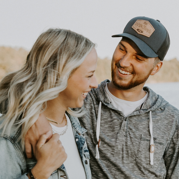 We The People Hat | Leather Patch Trucker Hat